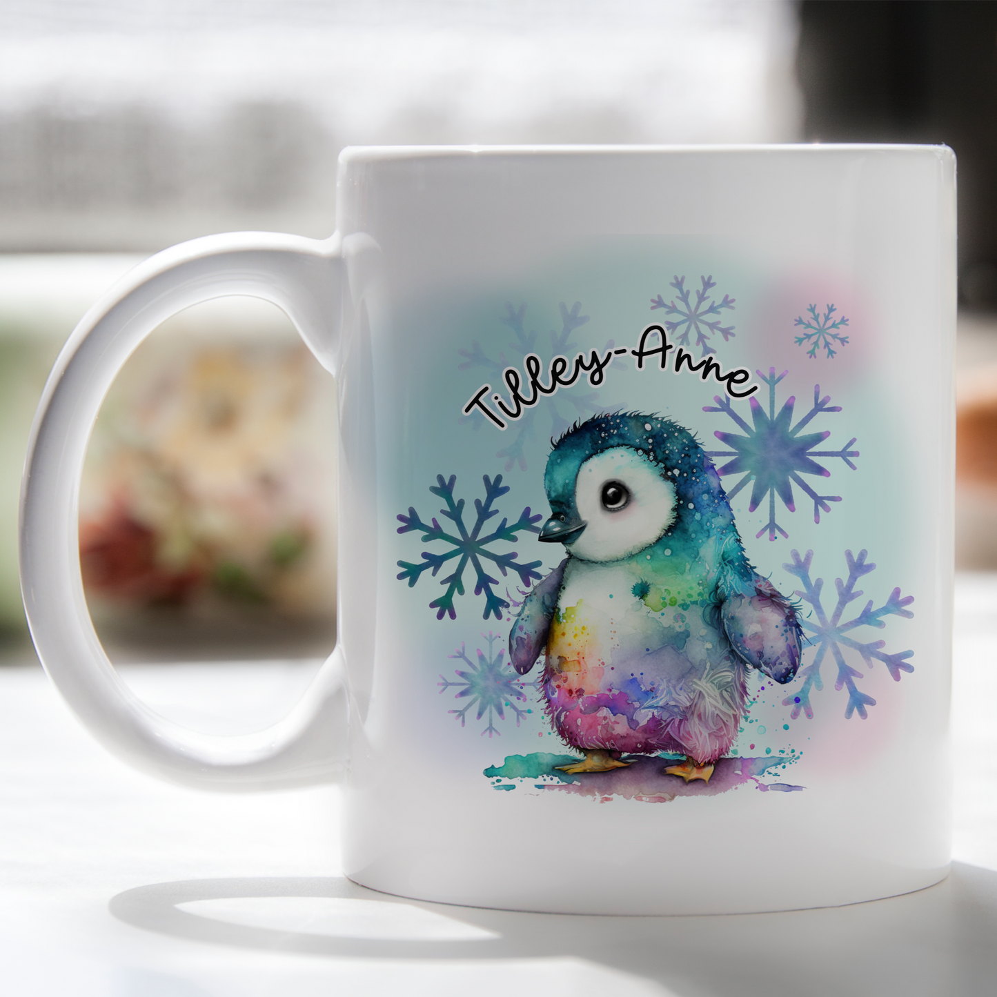 White mug with a colourful penguin design and personalised text from moose and goose gifts