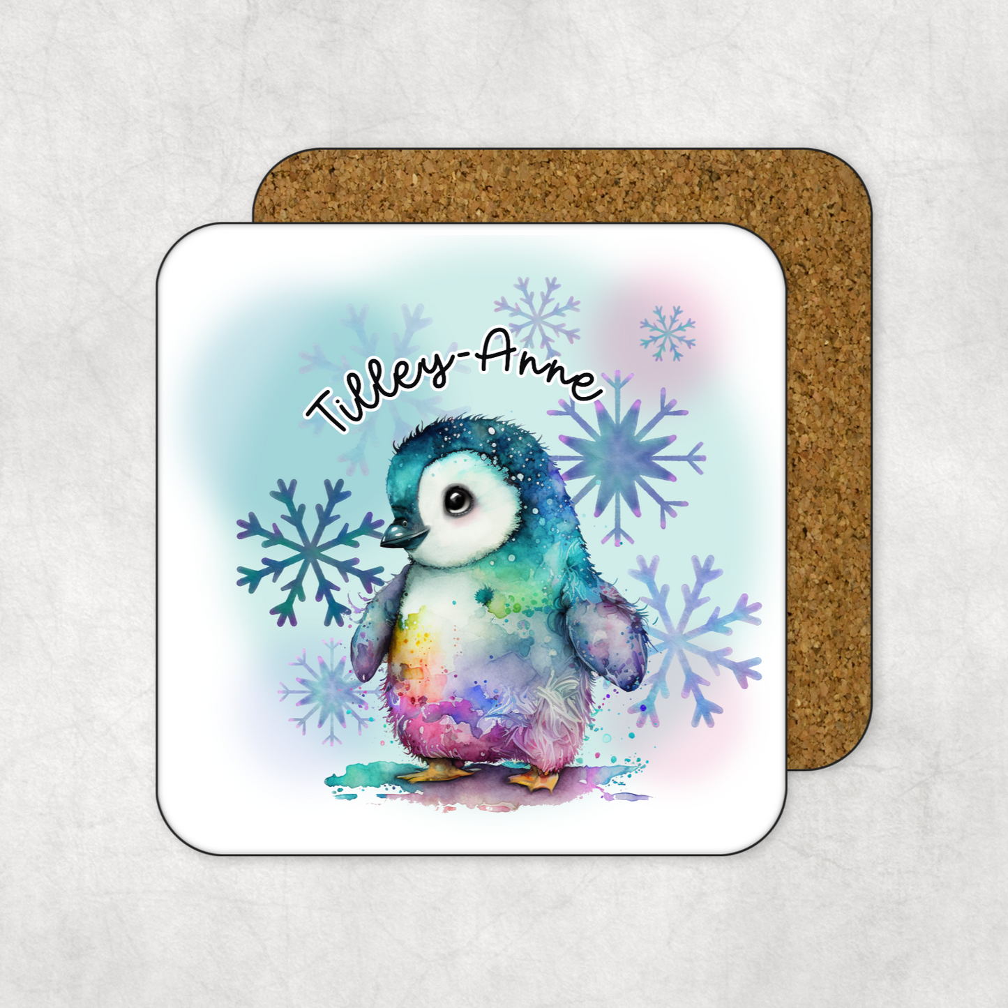 Coaster with a colourful penguin illustration and personalised text on a white background
