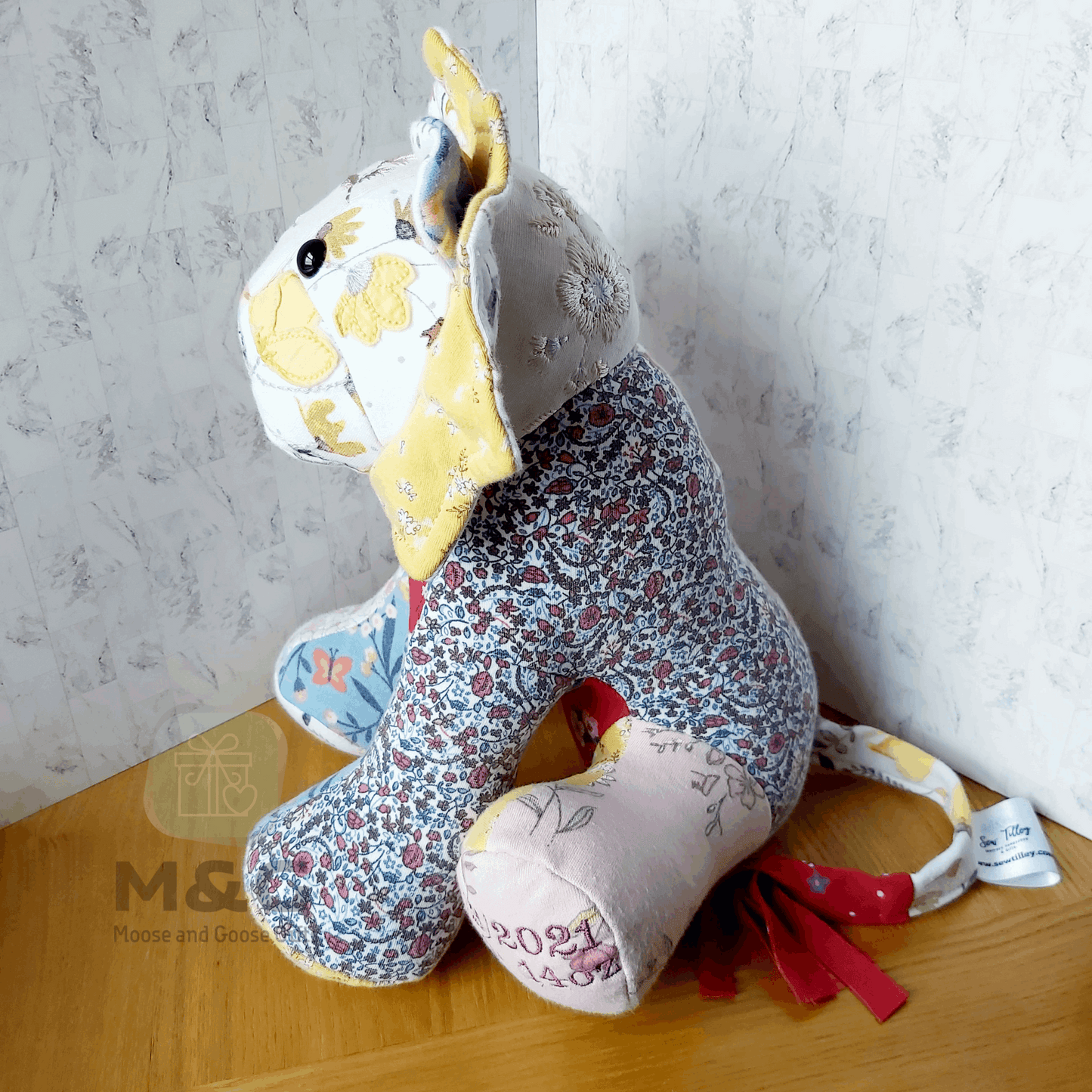 Keepsake lion made from clothing, side view 