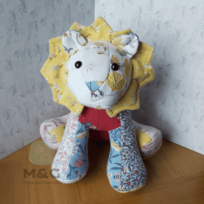 Handmade keepsake lion made from baby or loved one clothing - Front view