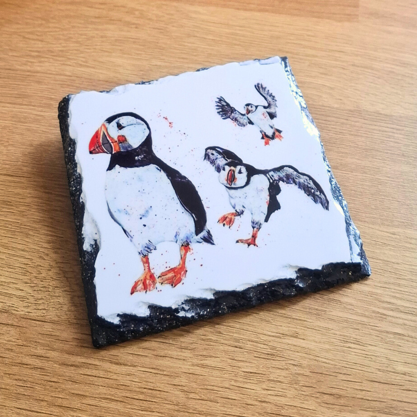 Slate coaster printed with a watercolour puffin design