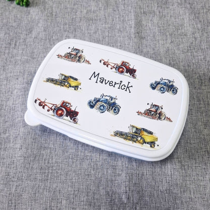 Personalised tractor snack box with colourful tractors and the name Maverick