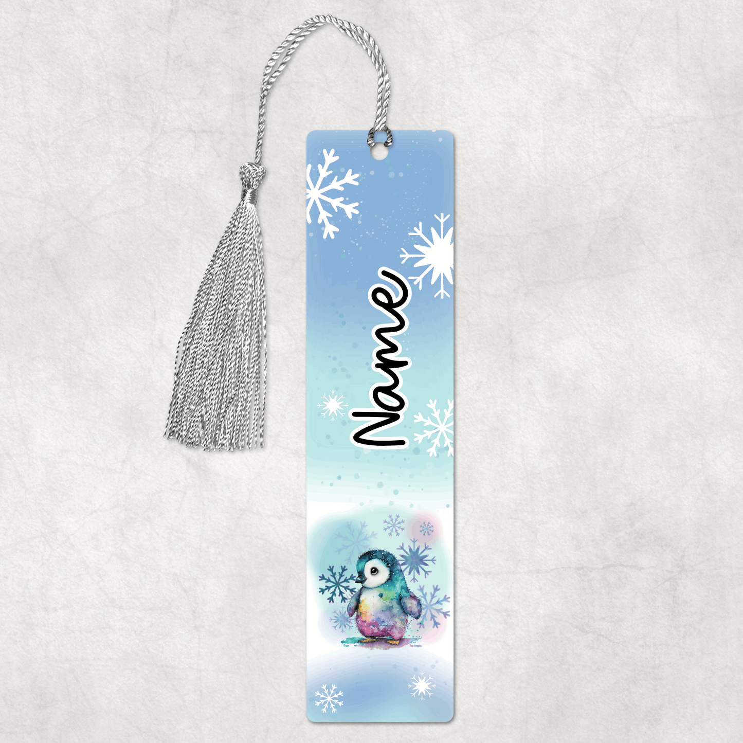 Bookmark with a penguin design and 'Name' text on a light blue background with snowflakes.