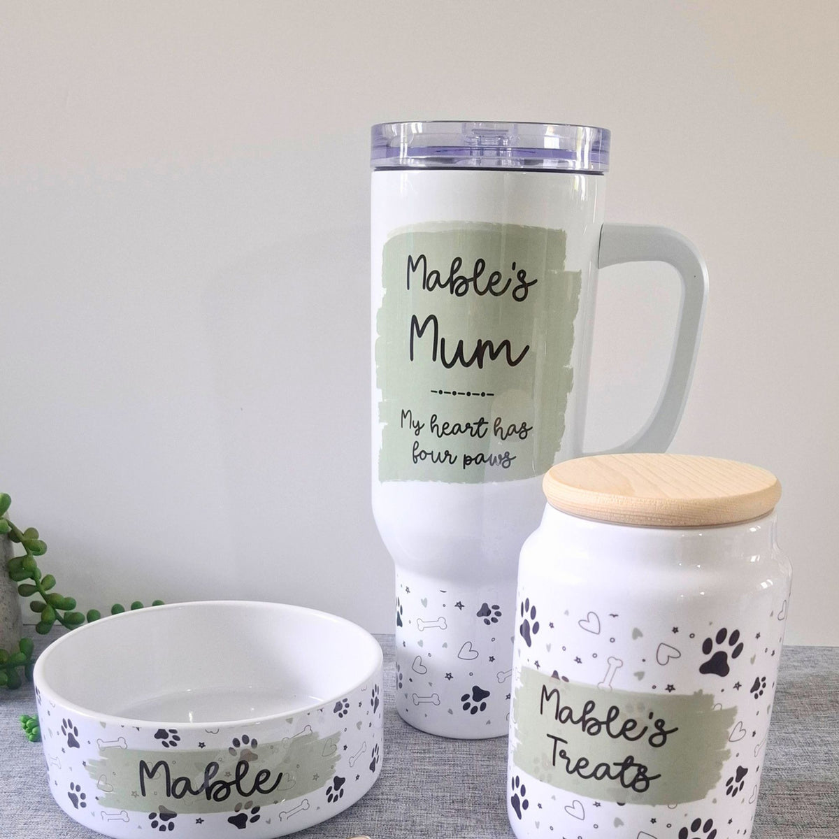 doodle paw pet collection consisting of 40oz tumbler, ceramic treat jar and ceramic pet bowl all personalised. 