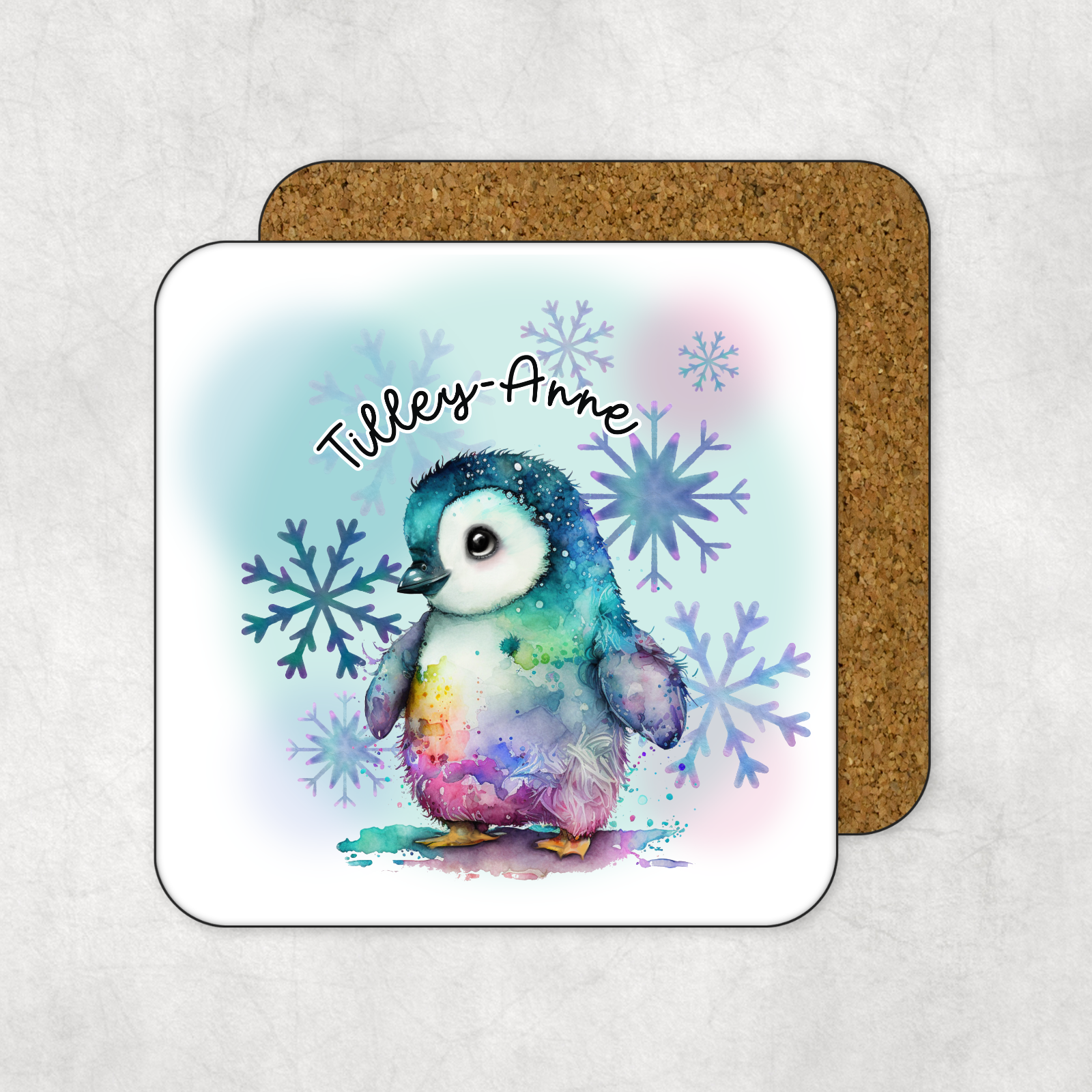 Coaster with a colourful penguin illustration and personalised text on a white background
