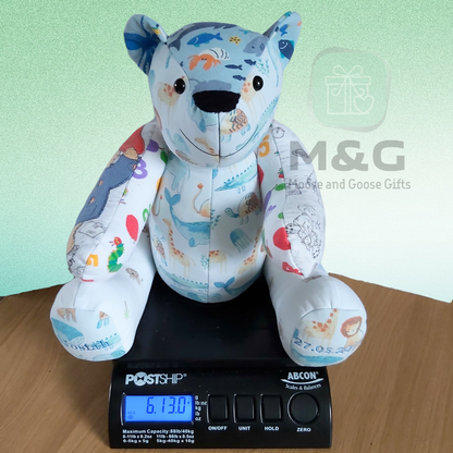 Weighted memory keepsake birth weight bear made from baby clothing 